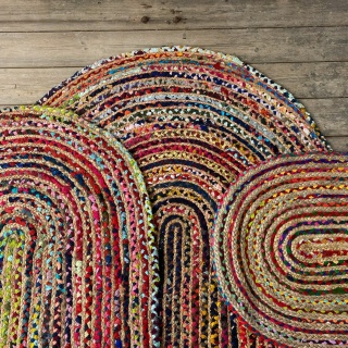 Colourful and hard wearing chindi cotton and jute oval rug for home interior use available in four sizes